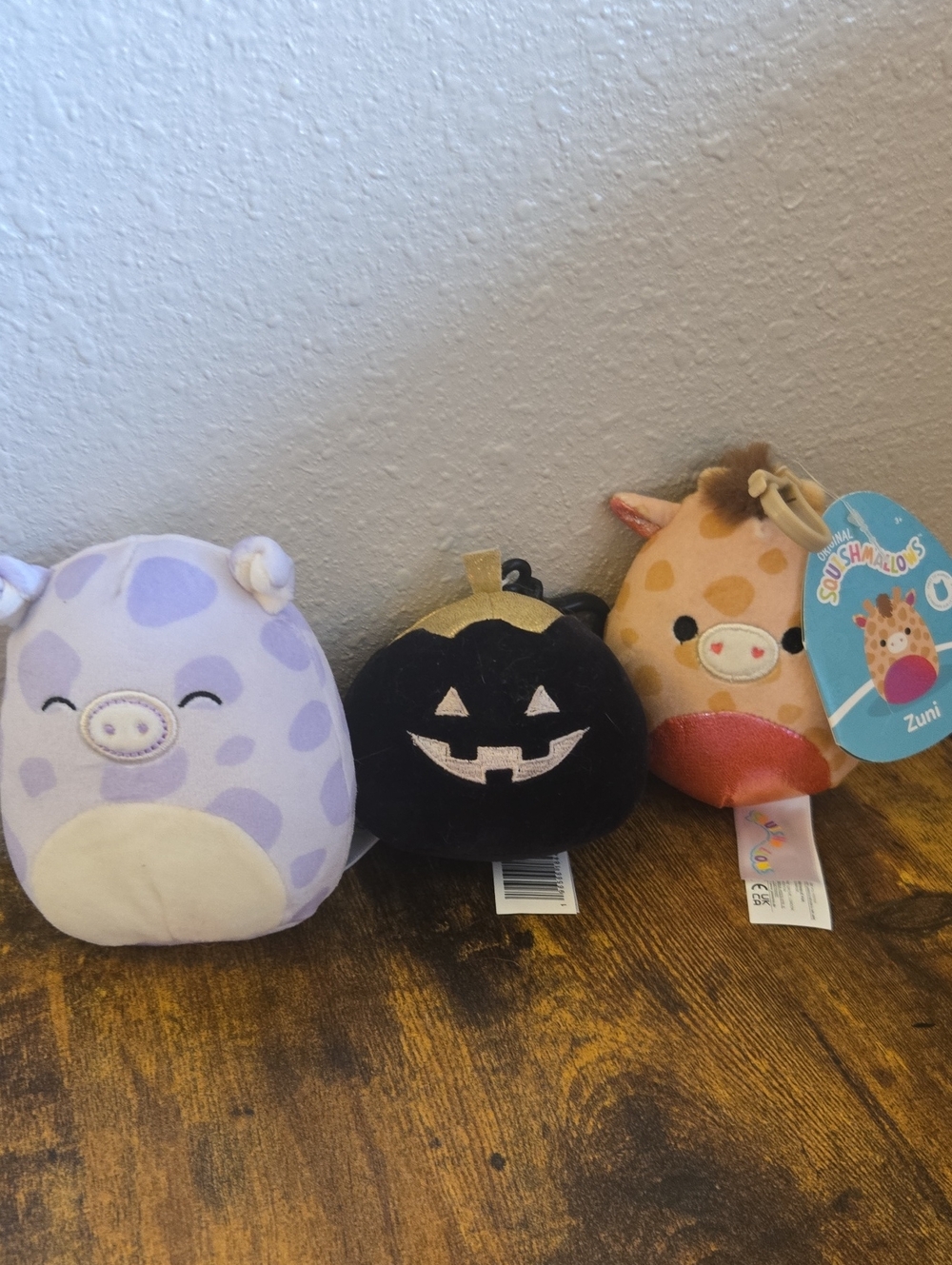 Squishmallows Purple Spotted Pig, Black Pumpkin & Orange Giraffe Plush Trio